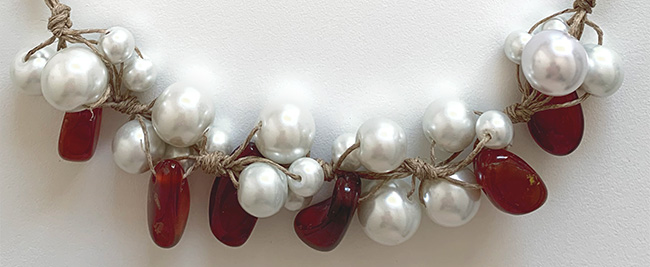 Pearls and red cornelians necklaces